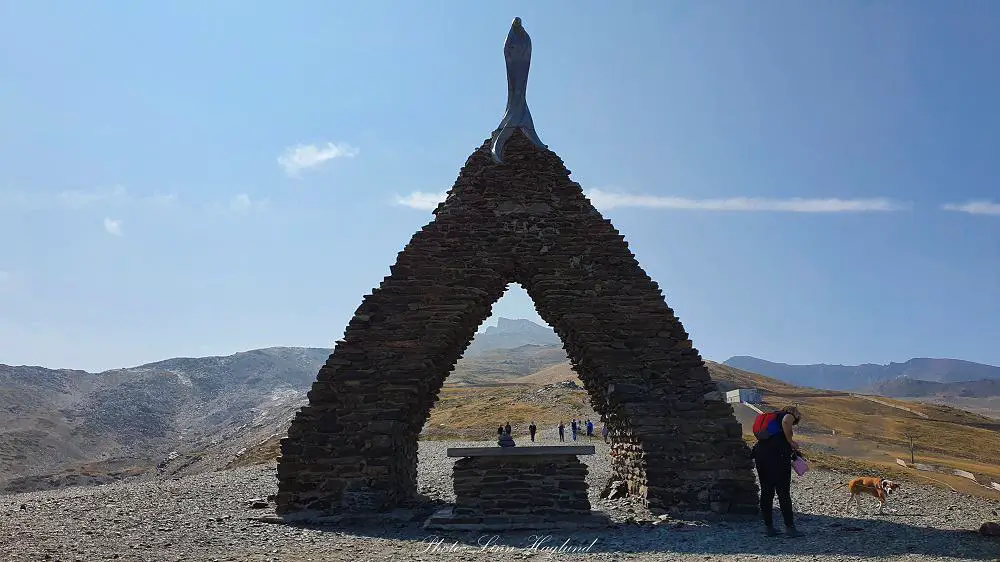 Pico Veleta seen through the monument of Virgen de las Nieves