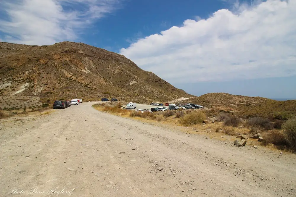 Where the dirt track meets the car park and the trail to Cala de San Pedro starts further ahead