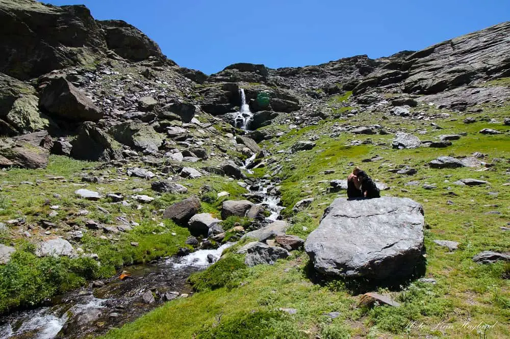 Relaxing in front of the waterfalls