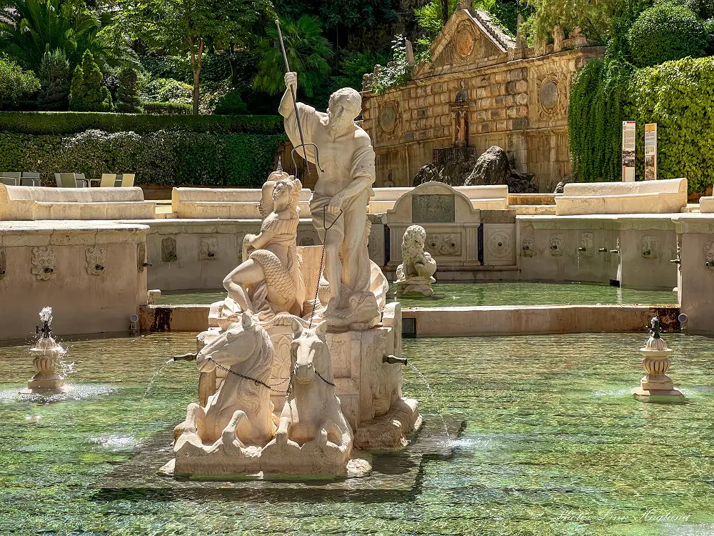 Kings Fountain in Priego de Cordoba, with a marble statue of Neptune.