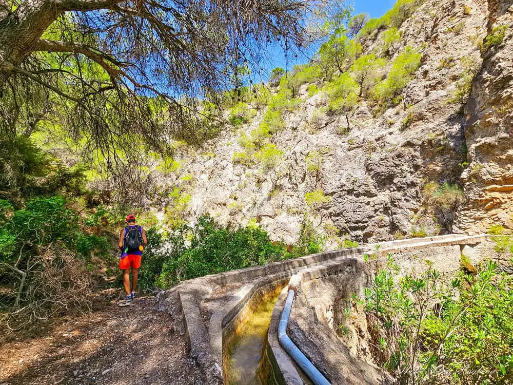 Mohammed is walking down from the Acequia.