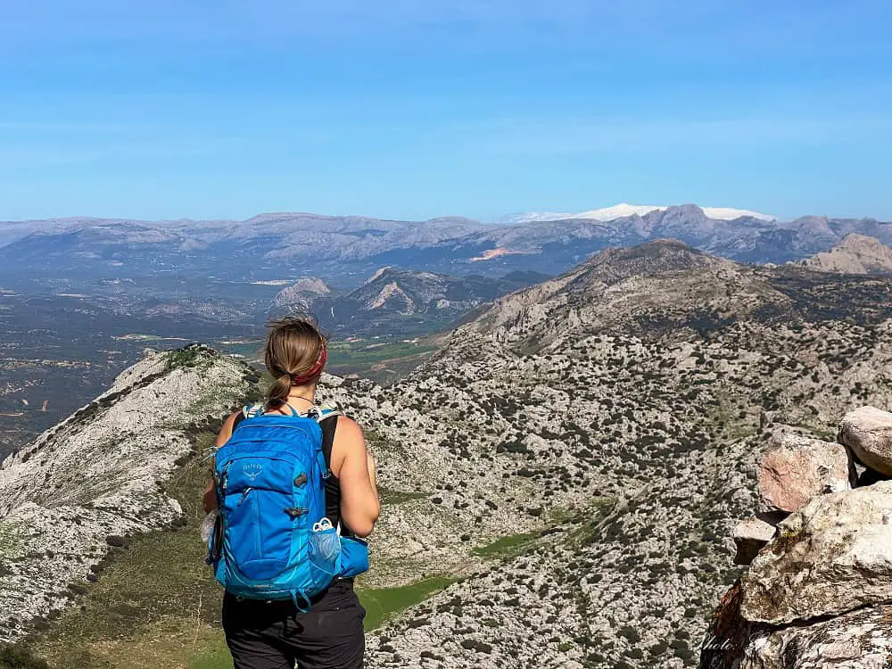 Hiking Camorro Alto Antequera with views of Sierra Nevada.