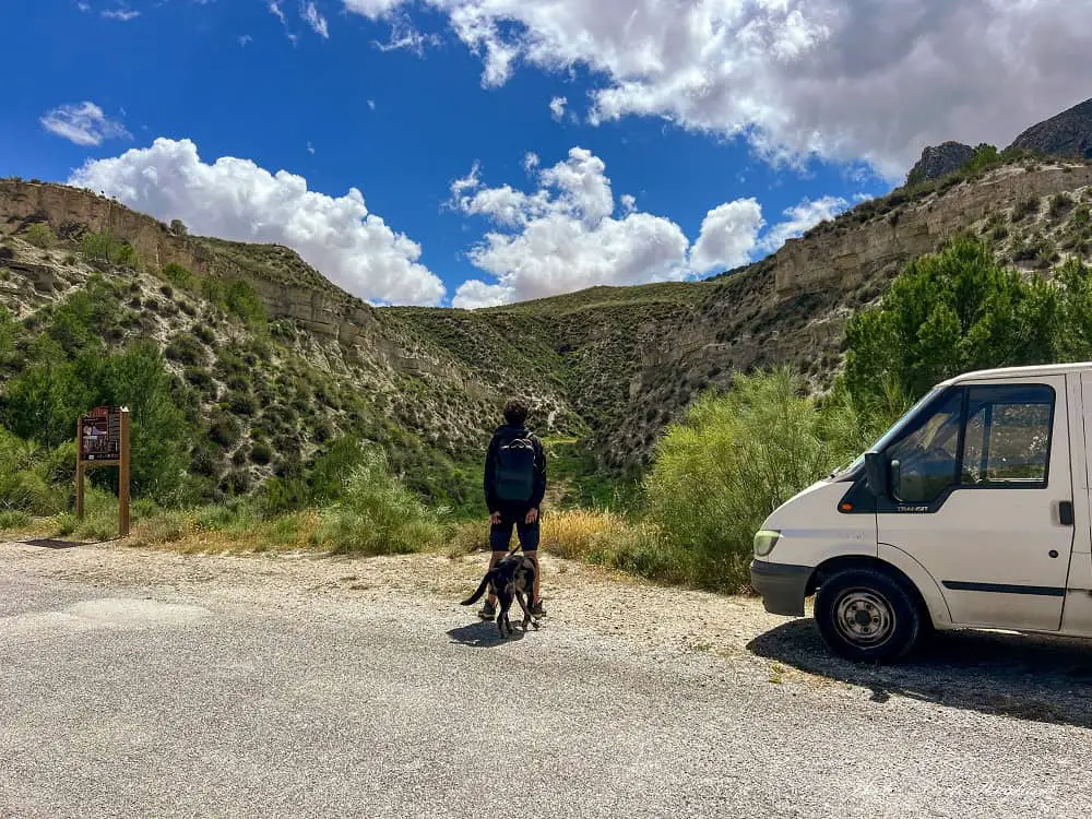 Mohammed and atlas standing by Falla de Baza and Castillo Benzalema trailhead.